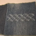 creation d'un tablier japonais avec une collection de pièces en jean reutilisées ..dont certaines brodées au sashiko